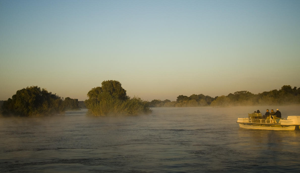 Explore the Upper Zambezi and surrounding Islands on an early morning Sunrise Boat Cruise